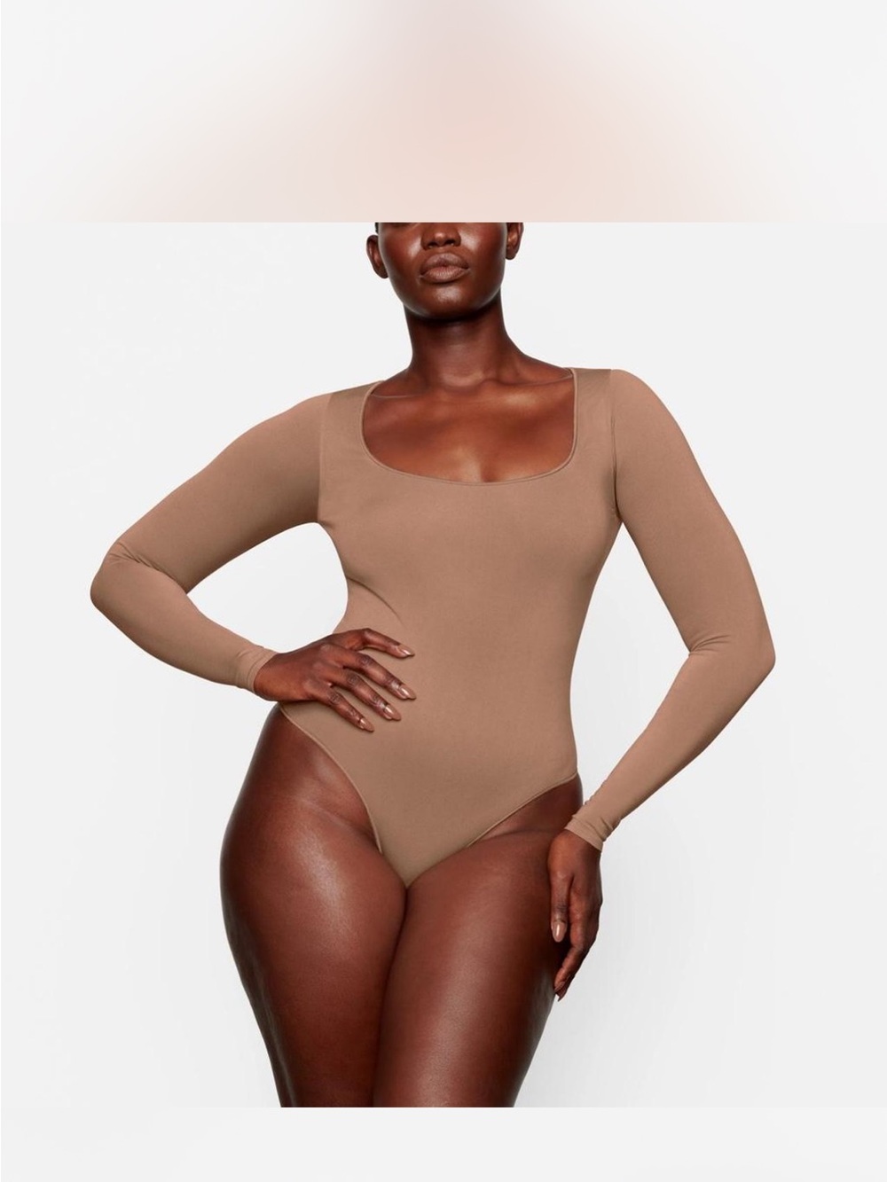 SKIMS Essential Long Sleeve Scoop Neck Bodysuit in Brown